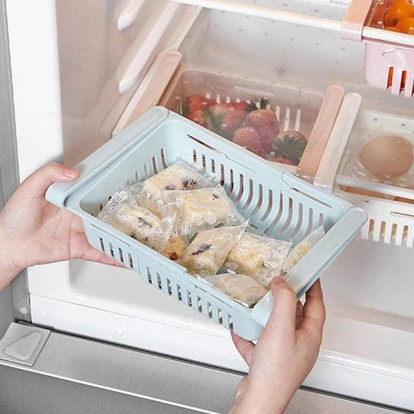 Adjustable refrigerator storage drawer basket